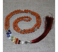 Rosary from rudraksha, decorated with semiprecious stones and silver